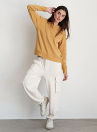 Softest Fleece Cargo Jogger in Cream- posing